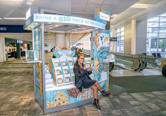 The founder of T-Rex Cookie on the sales cart. 