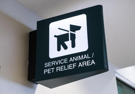 A sign marking a pet relief area